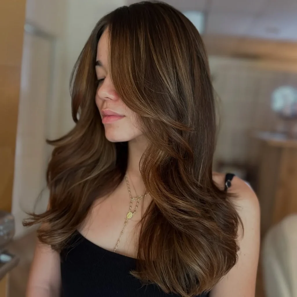 Chocolate Brown Balayage with Face-Framing Layers 