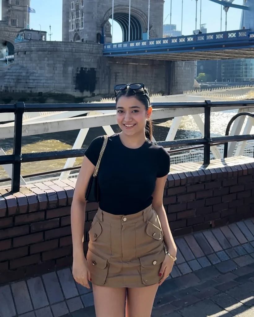 Black Fitted T-Shirt with Khaki Mini Skirt 