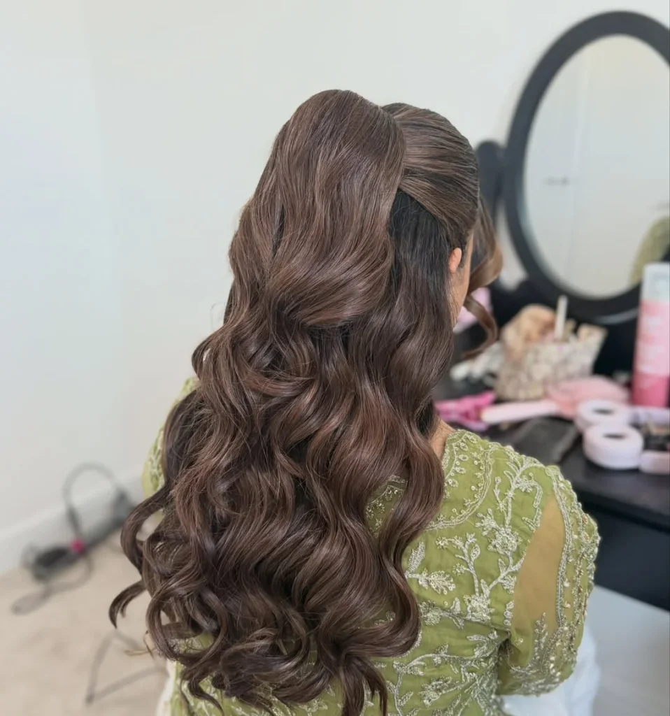 Voluminous High Ponytail with Soft Waves 
