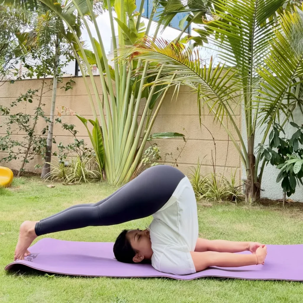 Plow Pose with Hands Clasped Behind the Back 