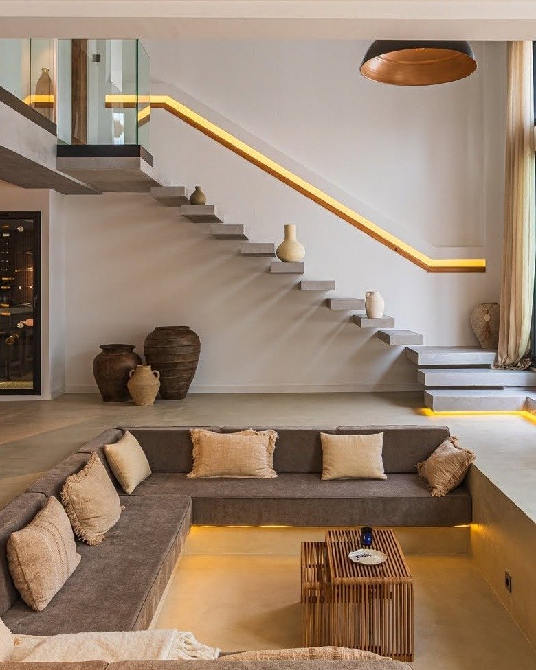 Sunken Living Room With Floating Staircase Design
