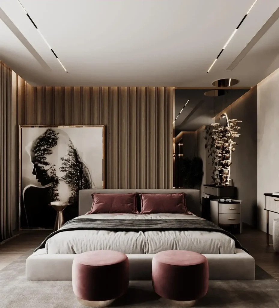 Low grey bed with two rose velvet stools, a pine-forest portrait and a timber slat wall
